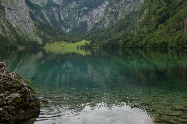 beautiful landscape of the lake in the mountains, Obersee lake, German Alps, reflections in water