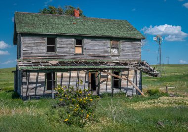 A long abandoned home on the South Dakota prairie is slowly being reclaimed by nature.