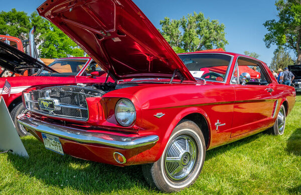 Canon City, CO, USA - June 10, 2023: Vintage cars and the peoople they