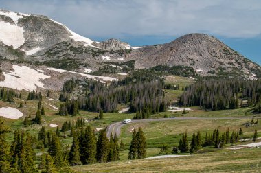 Photograph of the main road that brings sightseers to see the beautiful Snowy Range in Wyoming. clipart