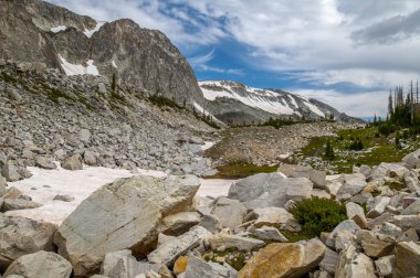 A mid-summer view of the Snowy Range of the beautiful and rugged Medicine Bow Mountains of southern Wyoming. clipart