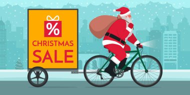 Noel Baba bisiklet sürüyor ve karavan reklamları yapıyor. Noel indirimi konsepti.