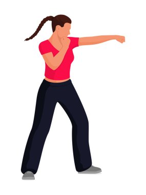 Kendine güvenen güçlü bir kadın yumruk atıyor, dövüşüyor ve kendini savunuyor.