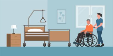 Tekerlekli sandalyedeki kıdemli adam ve bakıcı.