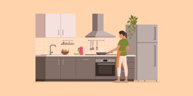 Mutfakta yemek pişiren kadın, tavada yemek pişiriyor, sağlıklı yemek ve yaşam tarzı kavramı.