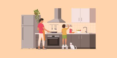 Anne ve kız mutfakta, ailede ve yaşam tarzında birlikte yemek pişiriyorlar.