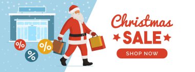 Noel Baba 'nın Noel alışverişi kutlu olsun. Elinde alışveriş poşetleri var. Satış ve konsept sunuyor.