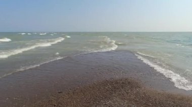 Panoramic view of Point Pelee National Park beach in the summer season, most southern part of Ontario, Canada. Strong winds and heavy waves at Lake Erie. Vacation and adventure in North America.