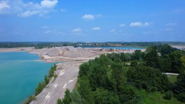 Small lakes water bodies near St Marys CBM Aggregates South aberfoyle pit. Building materials supplier in Cambridge, Ontario, Canada. Leading supplier of stone, sand and gravel for construction. clipart