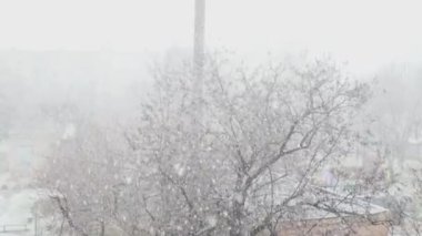 outside the window, the snow is slowly coming Cinematic 4k Background aesthetics