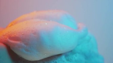 Magically, air foam appears on the hands Slow motiom Cinematic