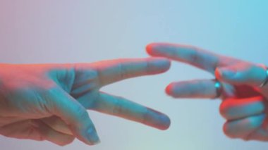 Stone Scissors Paper Game with Colored Lighting 4k Cinematic