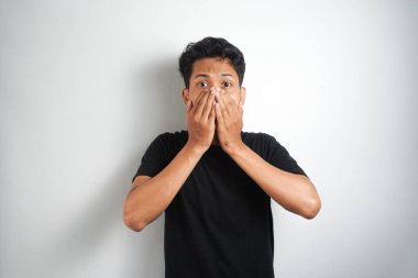 face of man covering his mouth with hand palm clipart