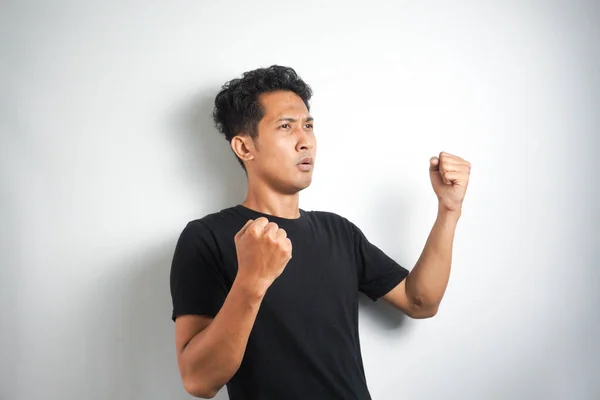 Happy Excited Smiling Young Asian Man Raising His Arm Celebrate — Stock Photo, Image