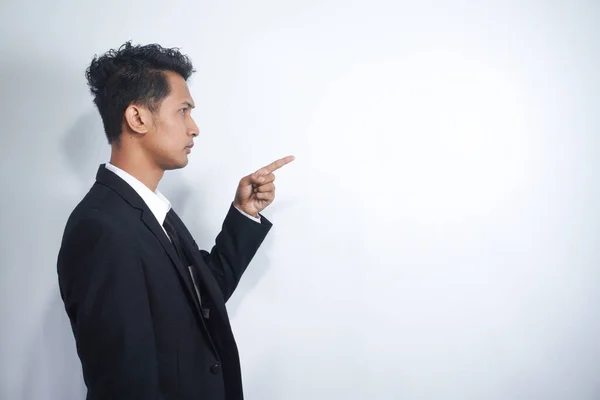 Portrait of smart confident man entrepreneur company owner point index finger suggest select promo adverts advertise ads wear formalwear outfit isolated over grey color background