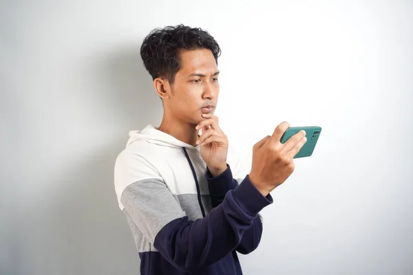 Smart Young Asian Man Confused Stresses Look Smartphone Studio Background — Stock Photo, Image