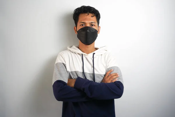 stock image Protection against contagious disease, coronavirus, covid-19. Man wearing hygienic mask to prevent infection, airborne respiratory illness such as flu, 2019-nCoV. indoor isolated on white background