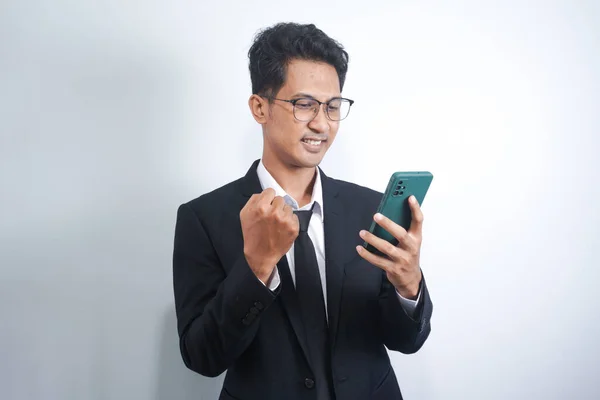 Excited Happy Young Asian Man Winner Feeling Joy Using Smartphone — Foto Stock