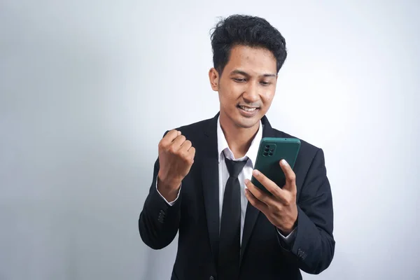Excited Happy Young Asian Man Winner Feeling Joy Using Smartphone — Foto Stock