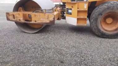 Balikpapan, 1 Mayıs 2023. Patenci / Tendem Roller, toprak, çakıl, beton veya asfalt yapımında ve köprü yapımında kullanılan sıkıştırıcı tipi ağır inşaat aracıdır..