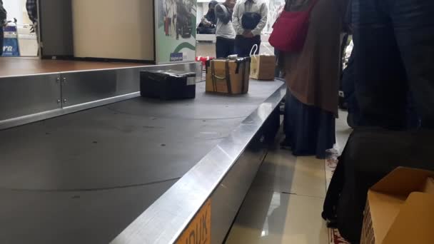 Balikpapan September Passengers Waiting Suitcases Bags Other Items Conveyor Belt — Stock Video