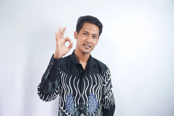 Young Man Wearing Batik Shirt Showing Oke Gesture Hands Eye — Stock Photo, Image