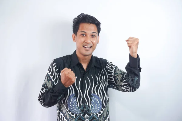 Excited Young Asian Man Wearing Batik Shirt Celebrating Victory Raised — Stock Photo, Image