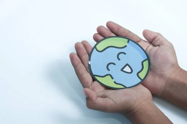 Hands holding smile earth paper cut, save planet, earth day, sustainable living, ecology environment, climate emergency action, world environment day concept, illustration for global warming content