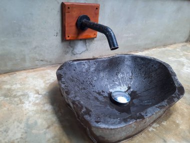 İç mekan antika taş lavabo, tüm taştan yapılmış bir lavabo eşsiz bir zanaat yapar..