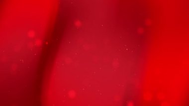 Yaygın ışık ve parlak parçacıklara sahip kırmızı arkaplan, festival tasarımları, tatil temaları ve çeşitli projeler için soyut arkaplanlar için ideal.