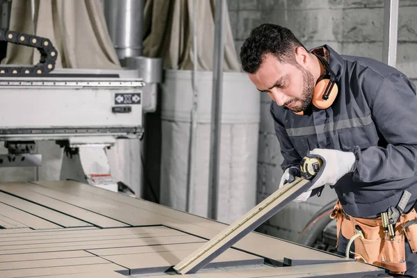 Wood turners measure and calculate the right size of workpiece dimension using hand and power tools. Cut, shape, rotate, smooth, and balance wood fixtures based on measurements and requirements.