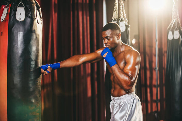 Boxers at the professional level routinely train by punching and kicking sandbags. To be successful in the individual's career, self-discipline, determination, and patience are essential qualities.
