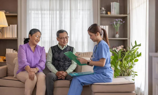 stock image Chiropractor perform home care physical assessments. Providing expert guidance on maintaining proper hygiene, implementing preventive care, making lifestyle adjustments, enhancing overall well-being.