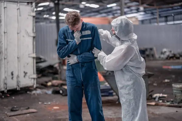 Industrial waste inspector wearing personal protective equipment to check hazardous chemicals, radioactive and toxic substances. Provide emergency first aid and immediate lifesaving care to workers.