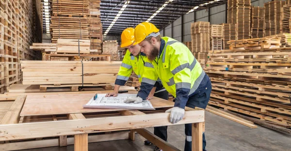 Woodworkers assess blueprints, select low-carbon materials, follow schemes for eco-friendly production. Quality, environmental responsibility are reflected in precise assembly, meeting high standards