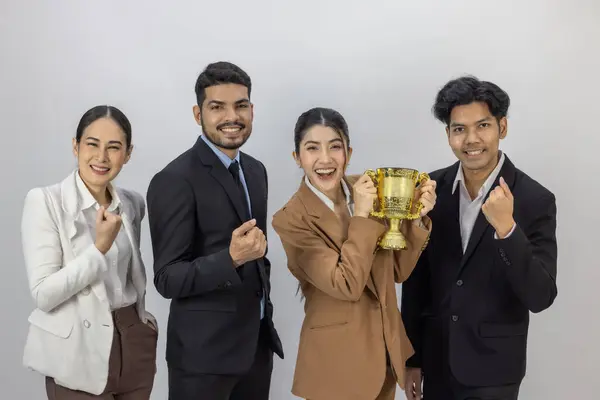Asian agile business team\'s performance receives positive client feedback and meets expectations. Each member is excited and celebrates enthusiastically. The business team\'s milestone celebration.