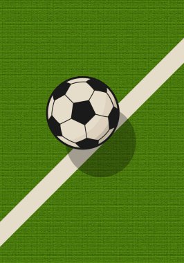 Yeşil zemin üzerinde futbol topu