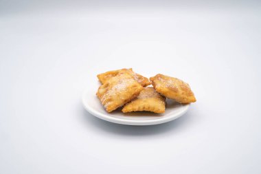 lies or chatter, carnival sweets on a plain white background during the carnival period 2023