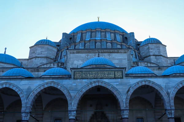 low angle view of mosque exteriro with a clear blue sky