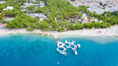 Aerial panorama of beautiful Rajska beach on the Rab island in Croatia. Paradise beach on the island of Rab in Croatia - the largest sandy beach in Lopar. clipart