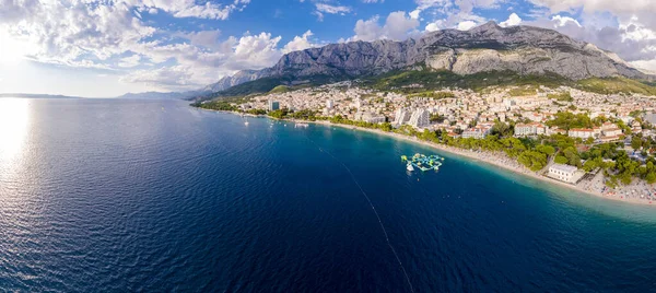 stock image Turquoise sea and stone beach by pine trees view, Dalmatia, Croatia