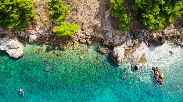 stock image Beautiful azure blue Mediterranean beach surrounded by green trees in Croatia