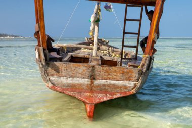 travelling Africa Kenya and Zanzibar seascape with crystal clear turquoise water and traditional sail boat landscape from Diani Beach and Watamu. Kendwa tour with wooden catamaran