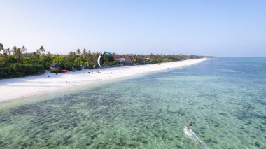 Zanzibar is a paradise for everyone who is looking for a holiday on a long sandy beach under palm trees.