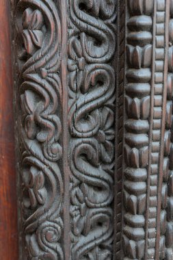 Take a closer look at the wooden masterpieces of Stone Town's doors in Zanzibar. These doors are a true reflection of the city's rich culture and history, with intricate carvings and designs that showcase the city's past and present