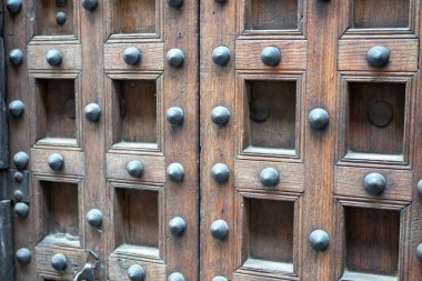 Zanzibar's ornate wooden doors in Stone Town showcase its rich history and culture. Their unique designs are a must-see for any visitor