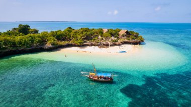 Experience the breathtaking view of Mtende Beach in Zanzibar, Tanzania, and enjoy a relaxing day by the ocean. The beach view will take your breath away and create unforgettable memories of your time in Tanzania