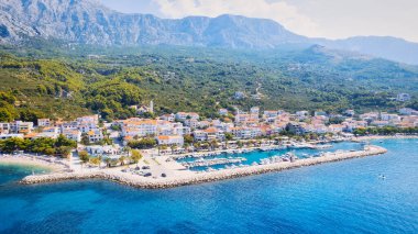 Take in the breathtaking view of Croatia's ports and marinas from above, showcasing luxurious yachts in a stunning drone photo.