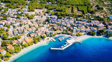 Take in the breathtaking view of Croatia's ports and marinas from above, showcasing luxurious yachts in a stunning drone photo.