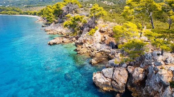 stock image Take in the breathtaking aerial view of Makarska Riviera in Croatia, revealing a picturesque rocky beach and the vibrant turquoise water.